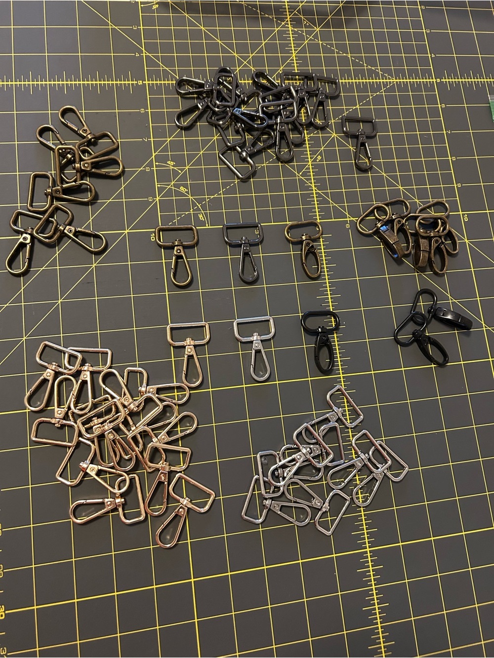 Purse/keychain hardware 
Mixed Metal Swivel Snap Hooks - Assorted Finishes